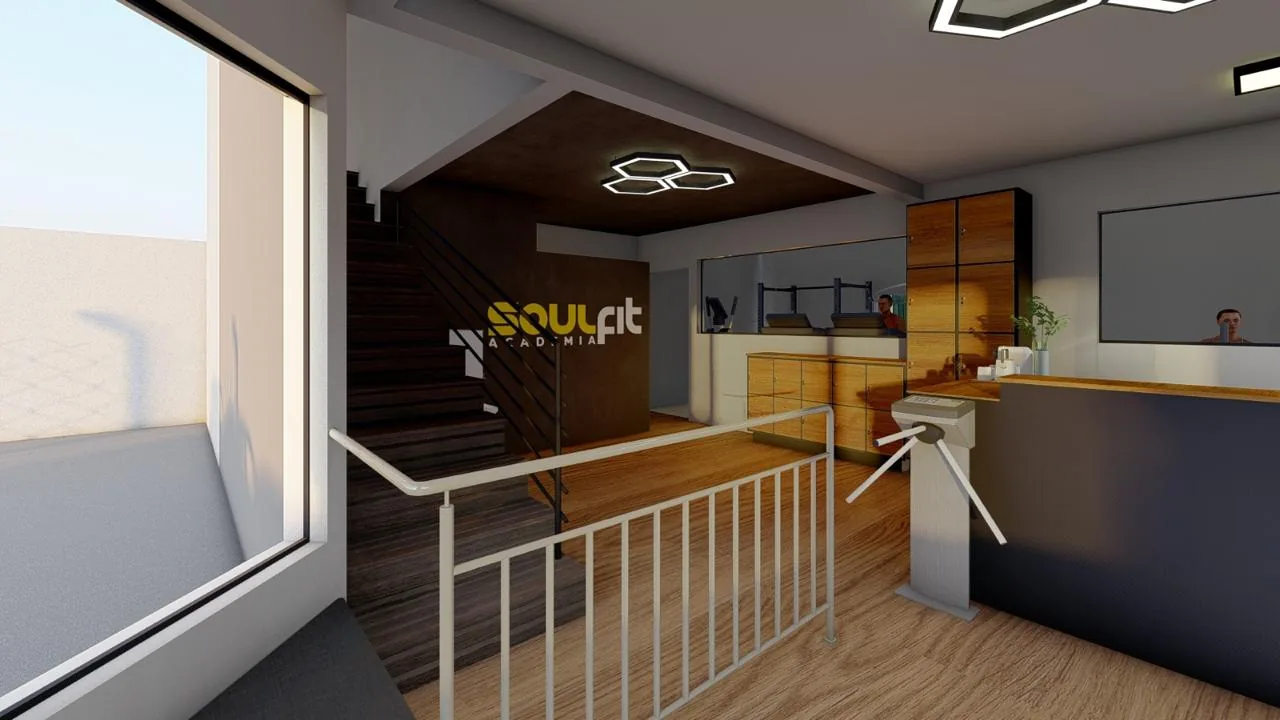 Recepção da SoulFit Academia com logotipo, escada, catraca e balcão